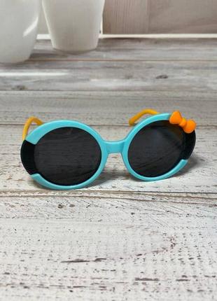 Детские солнцезащитные очки голубого цвета с милым бантиком на оправе6 фото