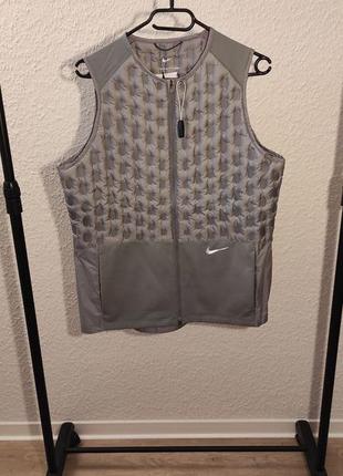 Жилет женский беговой пуховый nike therma-fit adv women s downfill running vest пуховая жилетка оригинал7 фото