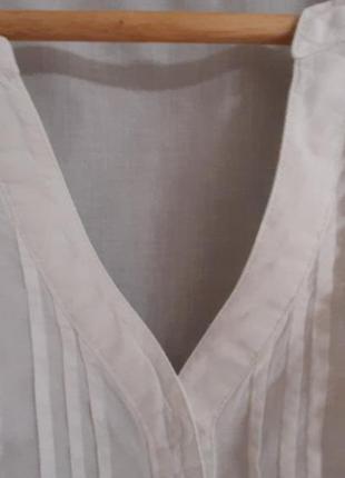 Блузка (туника) с маленькими рукавами.4 фото
