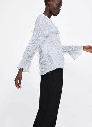 Блуза с бахромой