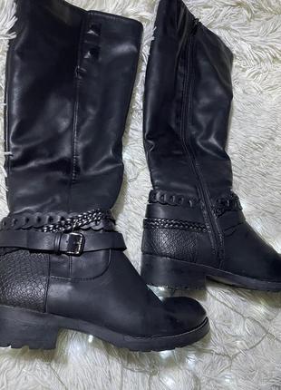 Високі чоботи