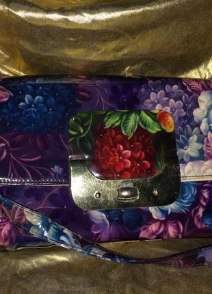 Продам фиолетовую сумку в цветочек1 фото