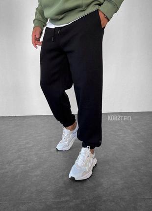 Чоловічі теплі спортивні штани на флісі з гумками звужені споривки на хлопця чудової якості1 фото