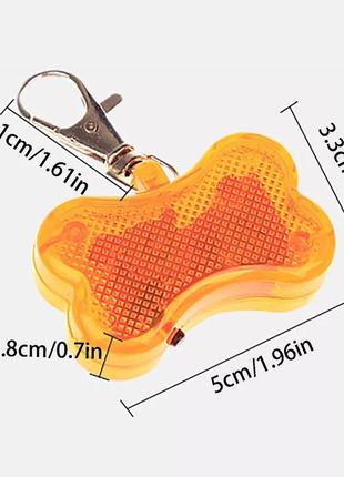Світиться синій брелок/кажоруч для собак на нашийник. кісточка.5 фото