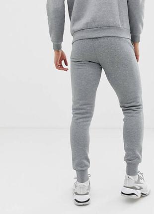 Оригінальні утеплені штани puma ess slim pants fleece / 852428037 фото