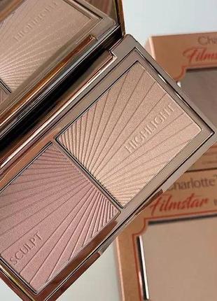 Charlotte tilbury filmstar bronze & glow light to medium палетка для контурингу бронзер хайлайтер