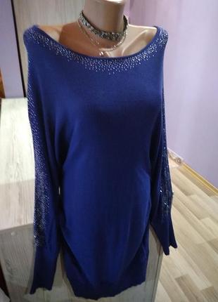 Стильное трикотажное платье,в низу на резинке,камушки на рукавах