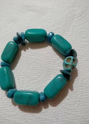 Браслет с черепом, пластик, на резинке.