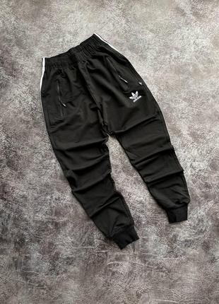 Чоловічі спортивні штани adidas чорні весняні осінні адідас з манжетами бавовняні5 фото
