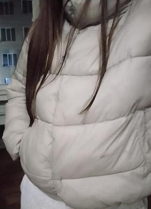 Классный пуховик .перо