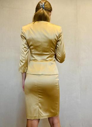 Костюм женский классический нарядно деловой с юбкой золотистый perspective8 фото