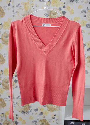 Трикотажний пуловер лососевого кольору