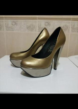 Шкіряні золотисті туфлі