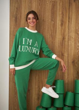 Жіночі трикотажні штани-джогери на гумі зеленого кольору. модель 2434 trikobakh3 фото