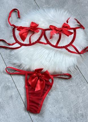 Сексуальное прозрачное нижнее женское белье: трусики и лиф с бантиками