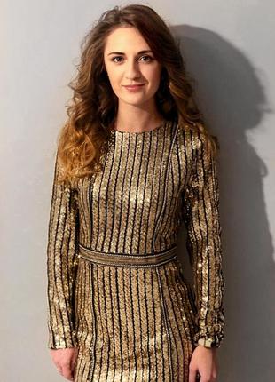 Платье в идеальном состоянии. очень качественное.