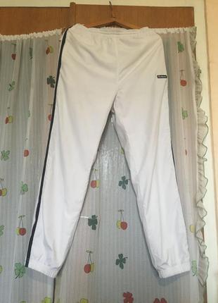 Спортивні штани білого кольору"ellesse"р l,поліестер.1 фото