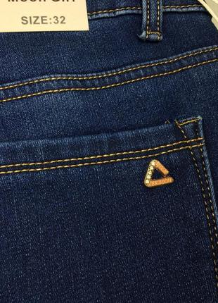 Женские синие джинсы на флисе большого размера4 фото