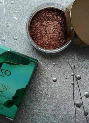 Освітлююча пудра для обличчя та очей ""kiko unexpected paradise transforming loose top coat