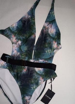 Суцільний купальник з відкритою спинкою