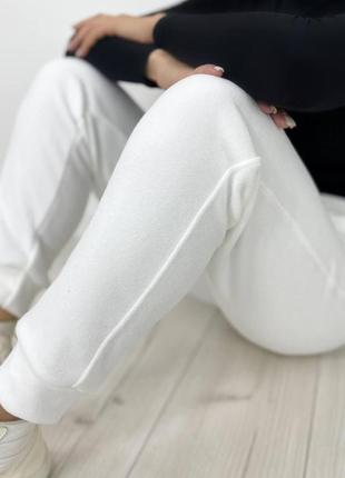Жіночі штани з флісу білі арт 0664 фото