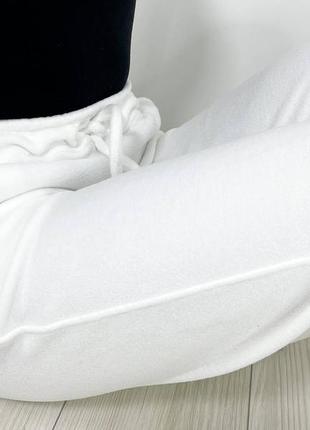 Жіночі штани з флісу білі арт 0665 фото