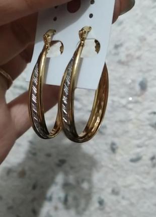 Ac сережки в срібно-золотому тоні