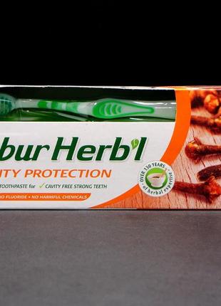 Зубная паста без фтора dabur herb’l glove  (дабур гвоздика) 150 грамм +зубная щетка в подарок!1 фото