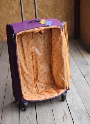 Фиолетовый текстильный чемодан l7 фото