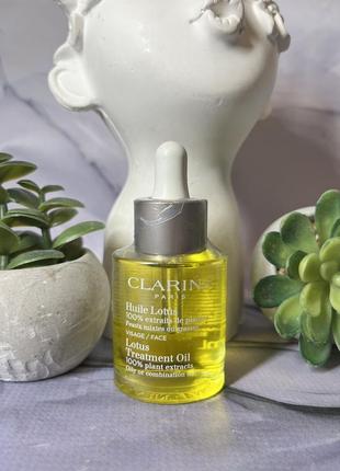 Оригінал масло для обличчя для жирної шкіри clarins lotus face oil treatment масло для лица оригинал для жирной кожи1 фото