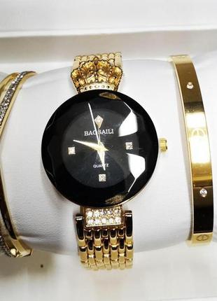 Популярные женские часы baosaili ( баосаили) золото-черные