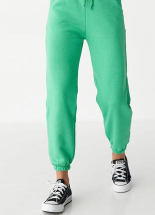Штани на флісі жіночі, зеленого кольору, джогери