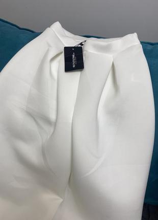 Широкі білі штани plt4 фото