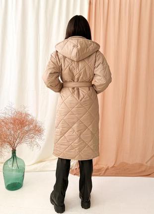 Зимове жіноче пальто.2 фото