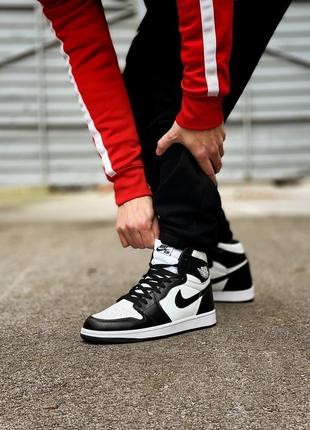 Шикарні кросівки nike air jordan 1 retro black white stockx чорно-білі7 фото