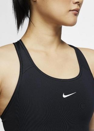 Женский спортивный топ nike dri-fit swoosh s1 фото