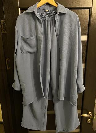 Костюм женский сине - голубого цвета