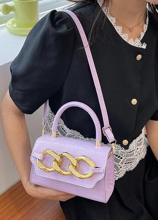 Женская классическая сумочка с кольцами на ремешке кросс-боди через плечо рептилия лиловая фиолетовая4 фото