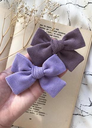 Бузкові/фіолетові бантики для волосся