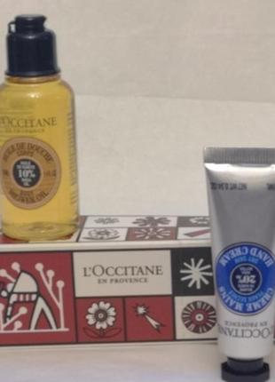 Набір l'occitane shea butter cracker ( масло д/душу 35мл + крем д/рук 10мл)1 фото