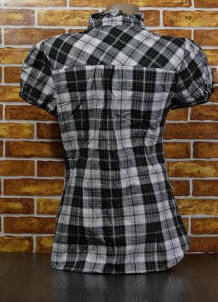 Женская блузка на пуговицах в клетку с коротким рукавом и бантом3 фото