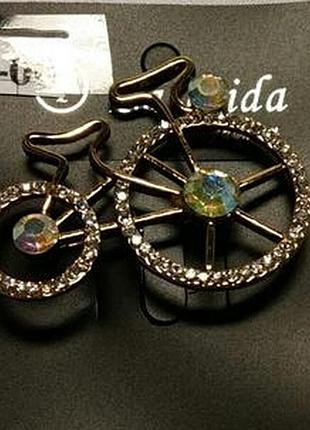 Стильная брошь велосипед