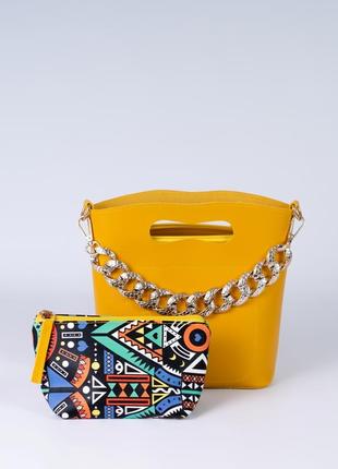 Жіноча сумка жовта сумка з ланцюжком сумка з косметичкою сумка 2в1 жовтий клатч1 фото