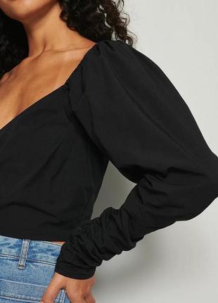 Блуза чёрная с объёмными рукавами2 фото