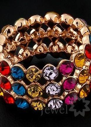 1, широкое кольцо  с покрытием  из золота  и с  разноцветными  кристаллами
