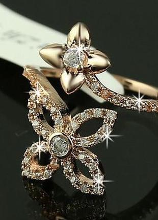 1, кольцо цветок  с покрытием  из  розового  золота   и австрийские кристаллы