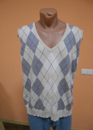 Вязаная жилетка