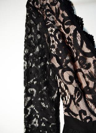 Роскошное  черное кружевное платье с глубоким вырезом и пышной юбкой3 фото