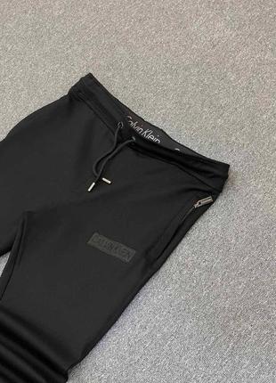 Спортивные штаны calvin klein черные / качественные теплые спорттивки кельвин кляйн на осень - зиму2 фото