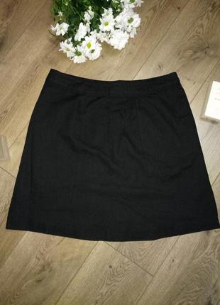 Отличная юбочка из италии с шифоновой вставкой спереди черная2 фото